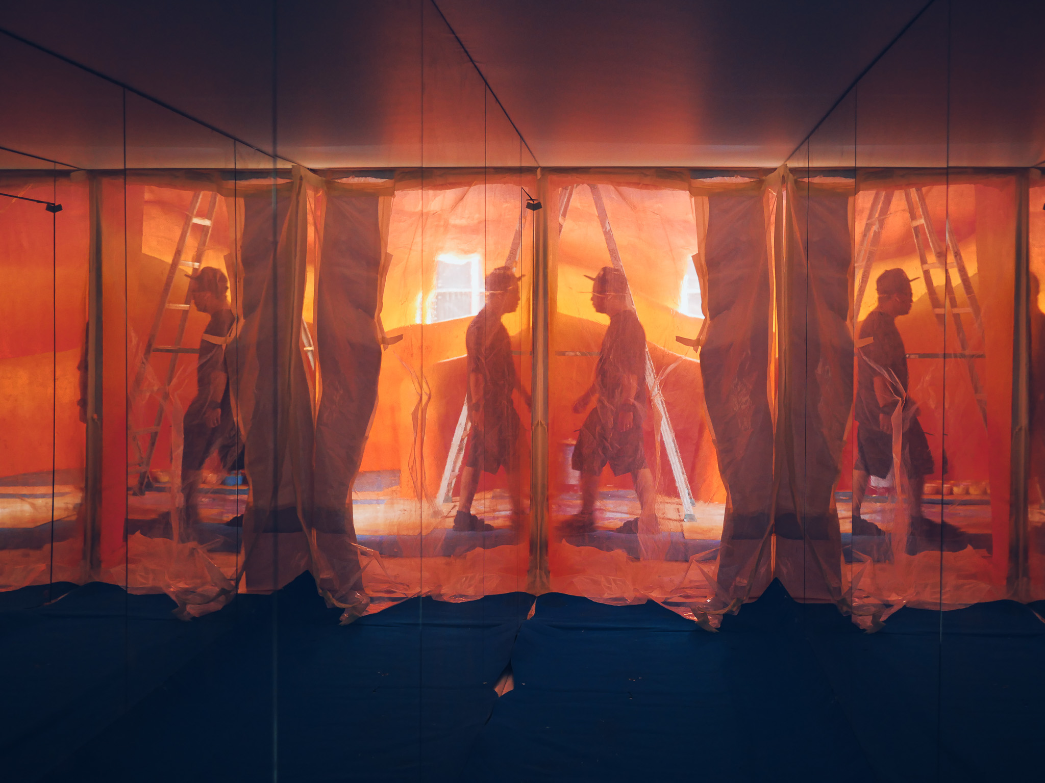 LKY album photograph with orange light and mirrored reflections